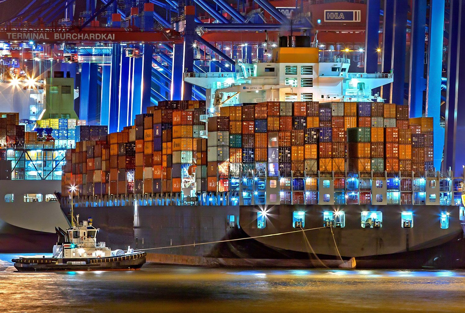 Container ship at night terminal
